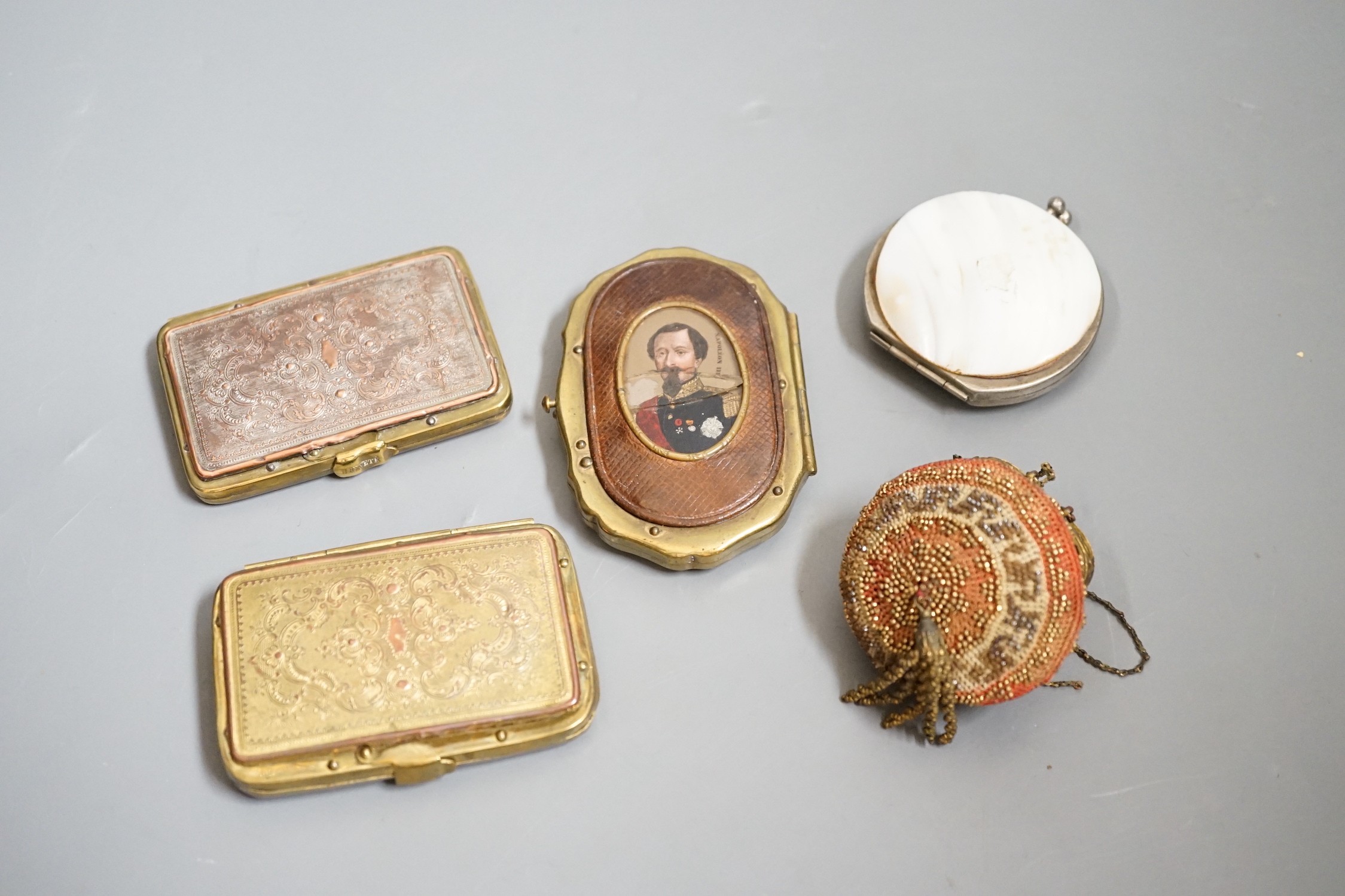 A 19th century Continental Royal commemorative purse and four Grand Tour souvenir purses